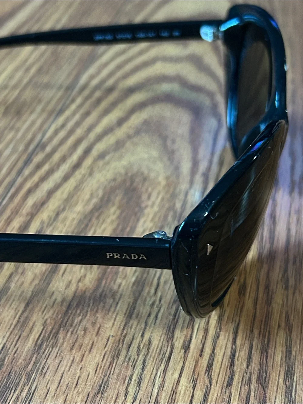 Prada SPR 16S 57-16 1AB-1A1 140 3N Cat-Eye Glossy Sunglasses -
